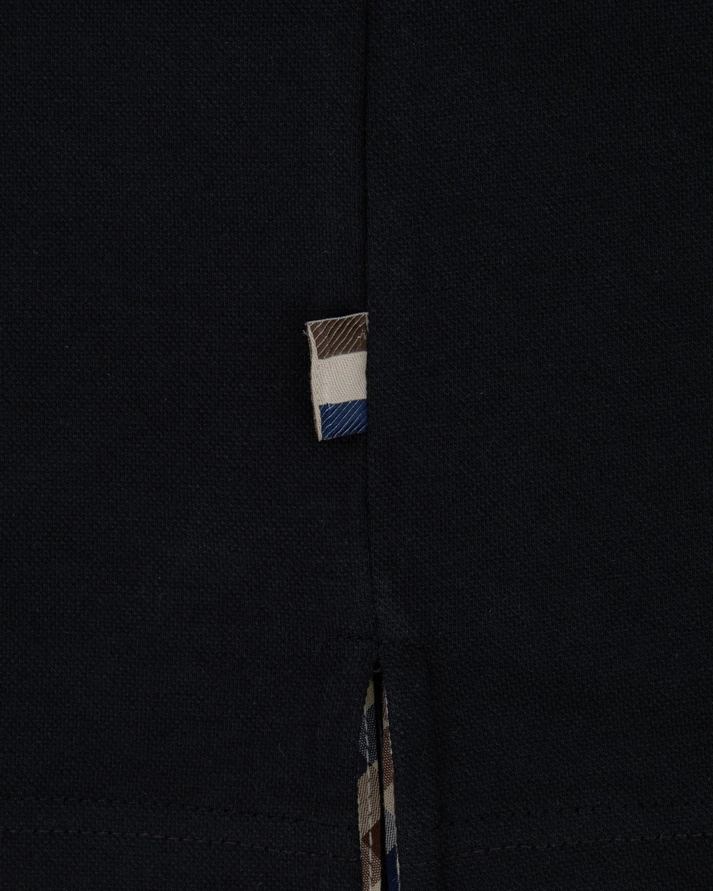 STRETCH PIQUE BADGE POLO