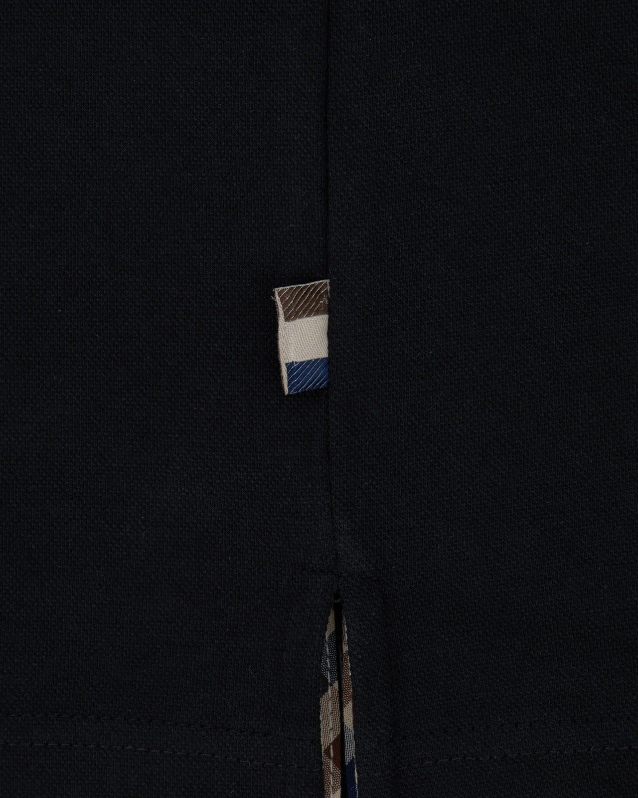 STRETCH PIQUE BADGE POLO