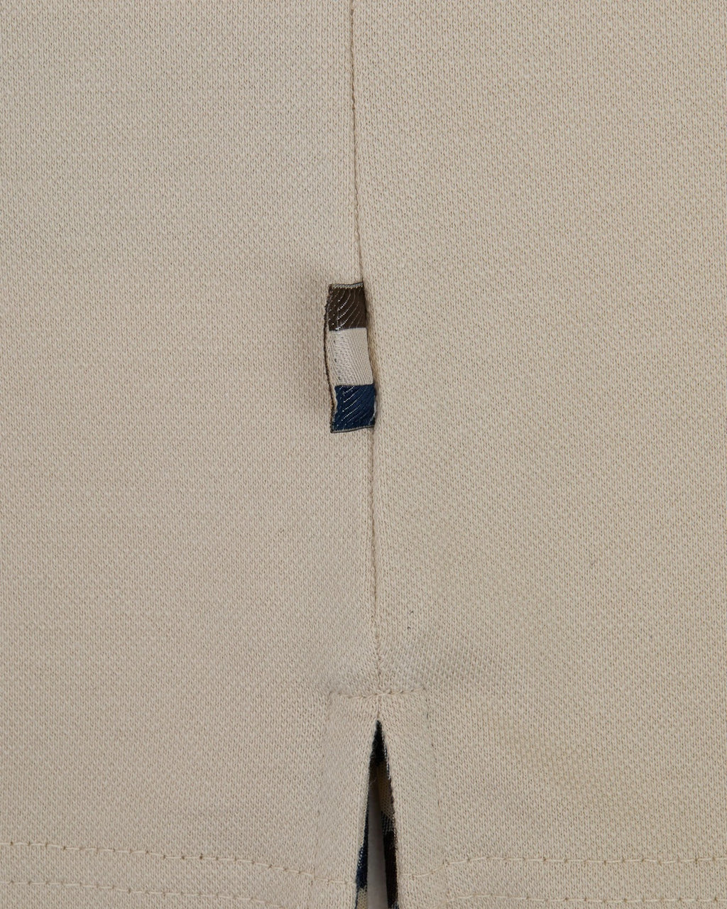 STRETCH PIQUE BADGE POLO
