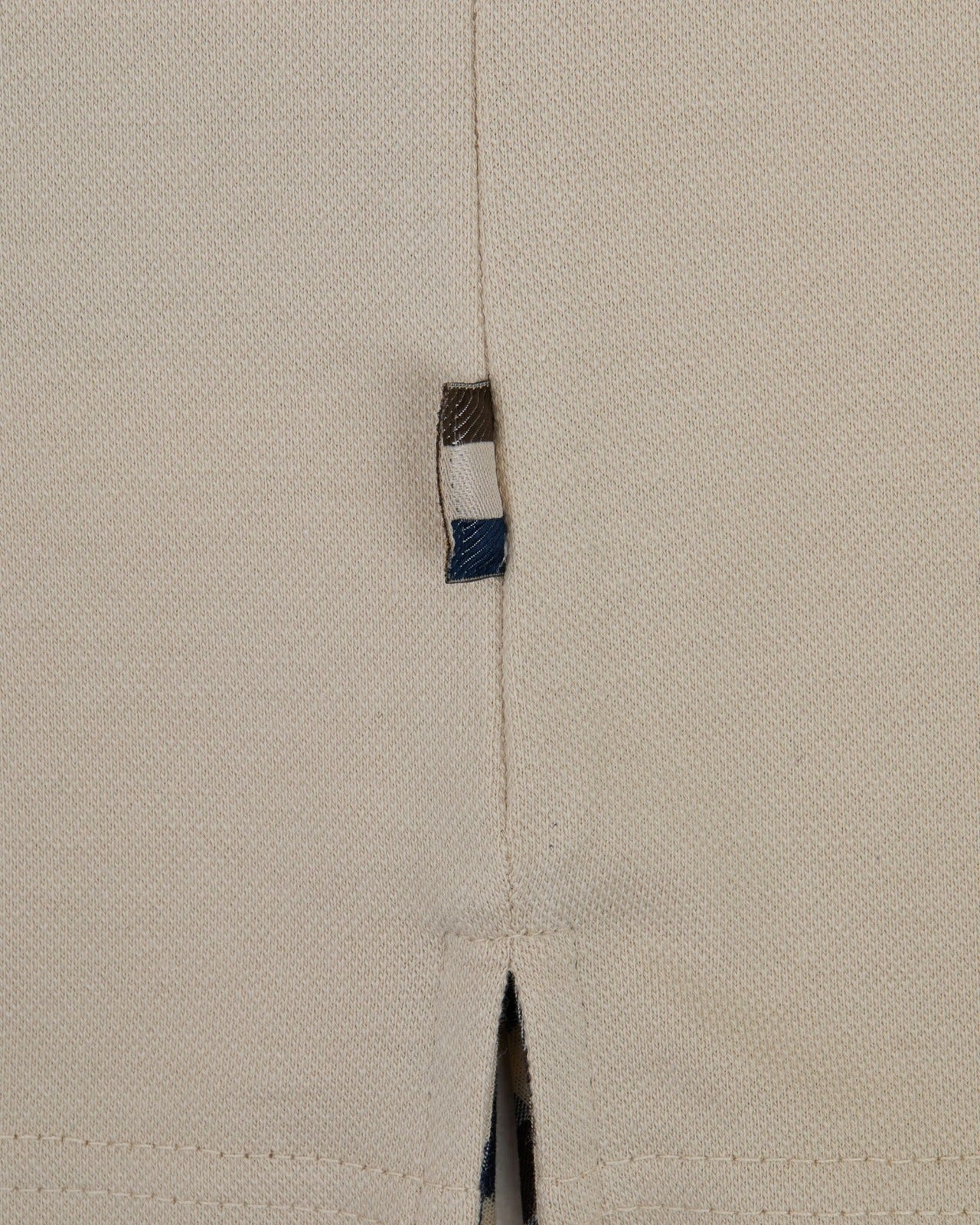 STRETCH PIQUE BADGE POLO