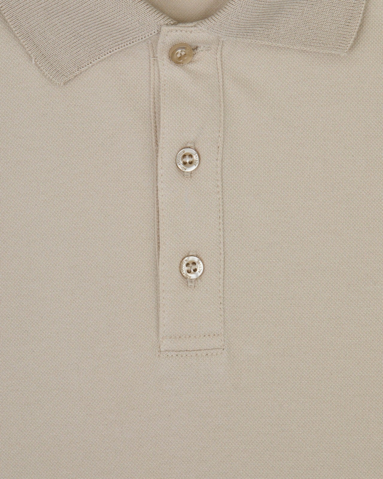 STRETCH PIQUE BADGE POLO
